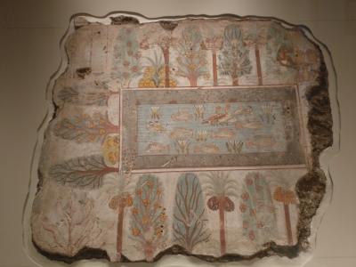 Egyptiläinen puutarha, seinämaalaus Nebamumsin haudasta Theba 1380 ekr. Koristelampi keskellä, pyhiä lootuksenkukkia ja mm taatelipalmuja